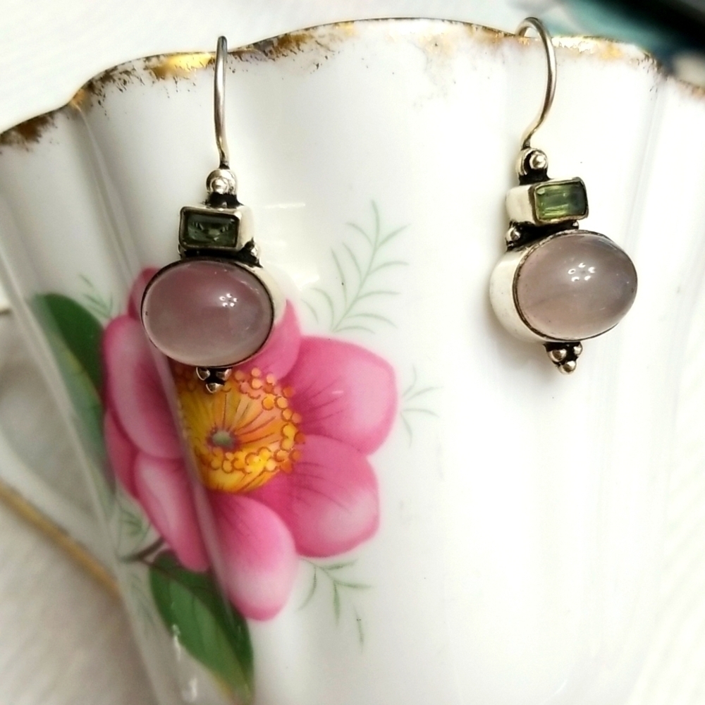 Silver hand made earrings about an inch .Not marked.